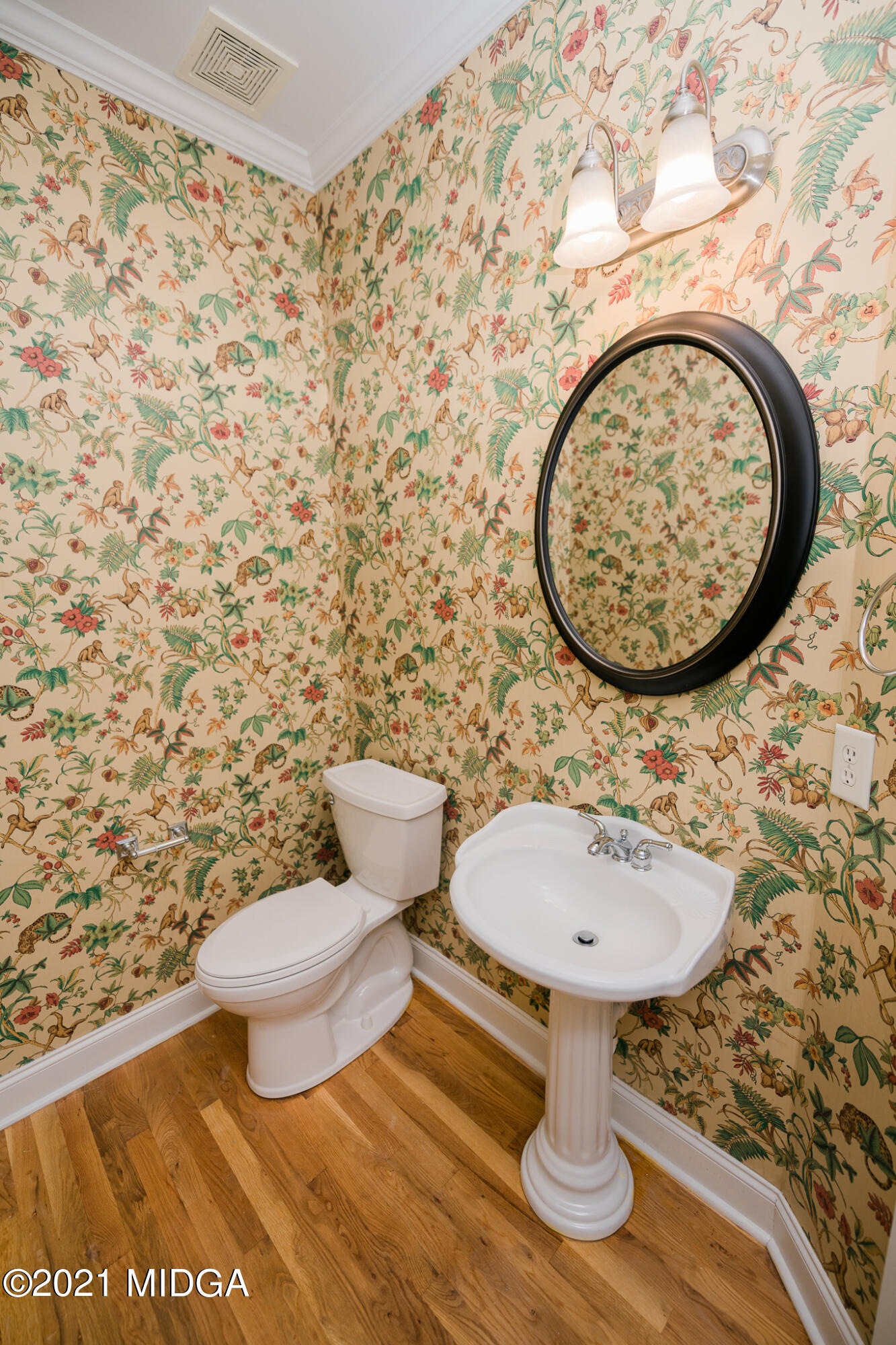 116 Hampton Ridge Road Macon, GA 31220 - Photo 23 of 77 a bathroom with a toilet and a sink