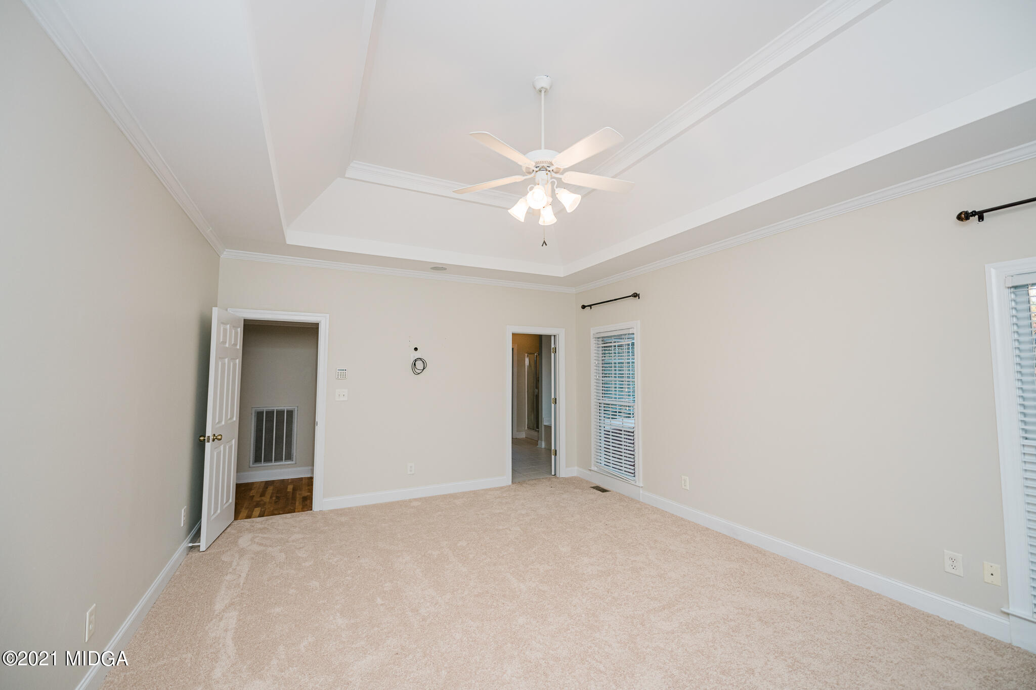 116 Hampton Ridge Road Macon, GA 31220 - Photo 27 of 77 a view of an empty room with a ceiling fan