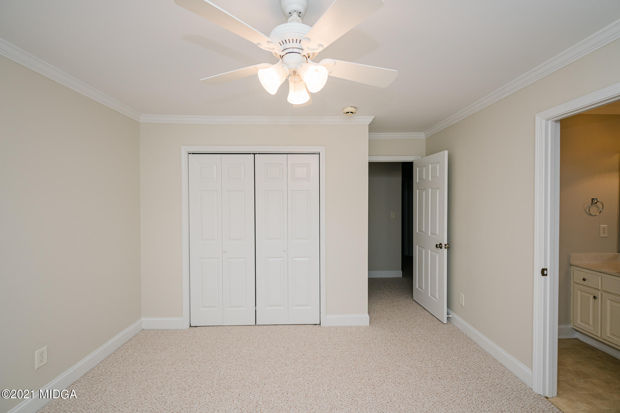 116 Hampton Ridge Road Macon, GA 31220 - Photo 35 of 77 a view of an empty room with a chandelier fan