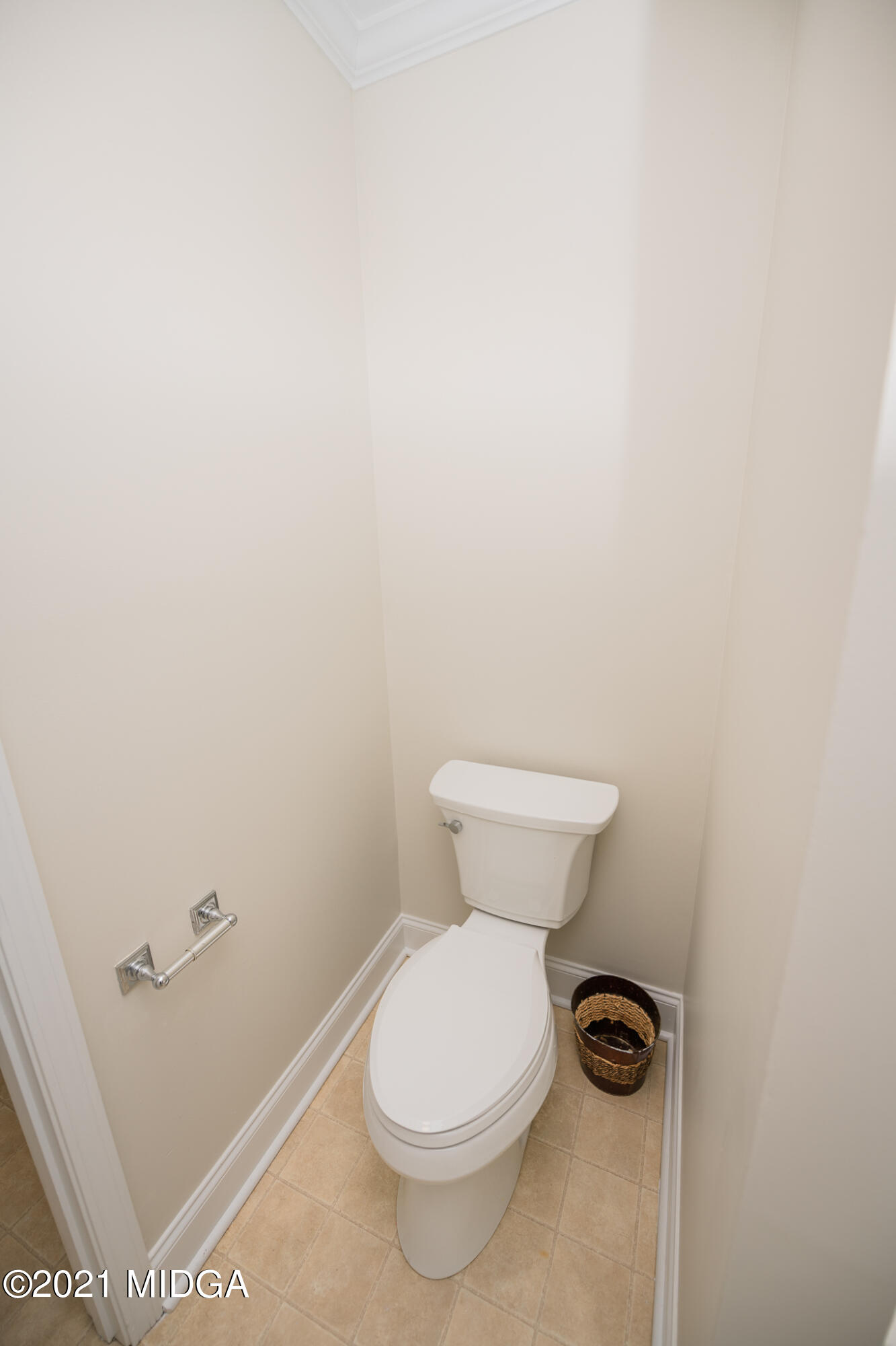 116 Hampton Ridge Road Macon, GA 31220 - Photo 45 of 77 a white toilet sitting next to a white wall