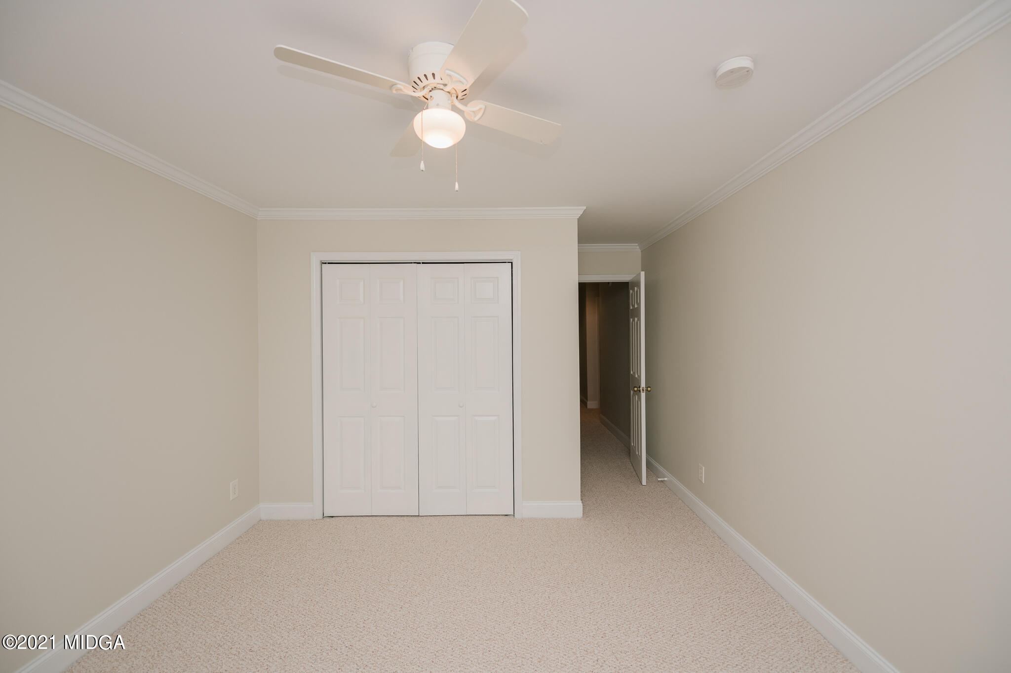 116 Hampton Ridge Road Macon, GA 31220 - Photo 47 of 77 an empty room with a fan and a window