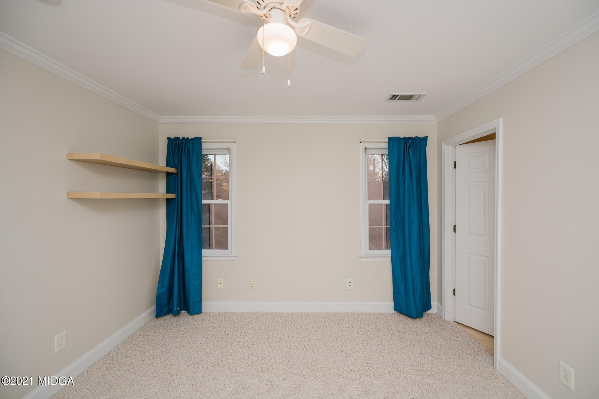 116 Hampton Ridge Road Macon, GA 31220 - Photo 48 of 77 a view of an empty room with a chandelier