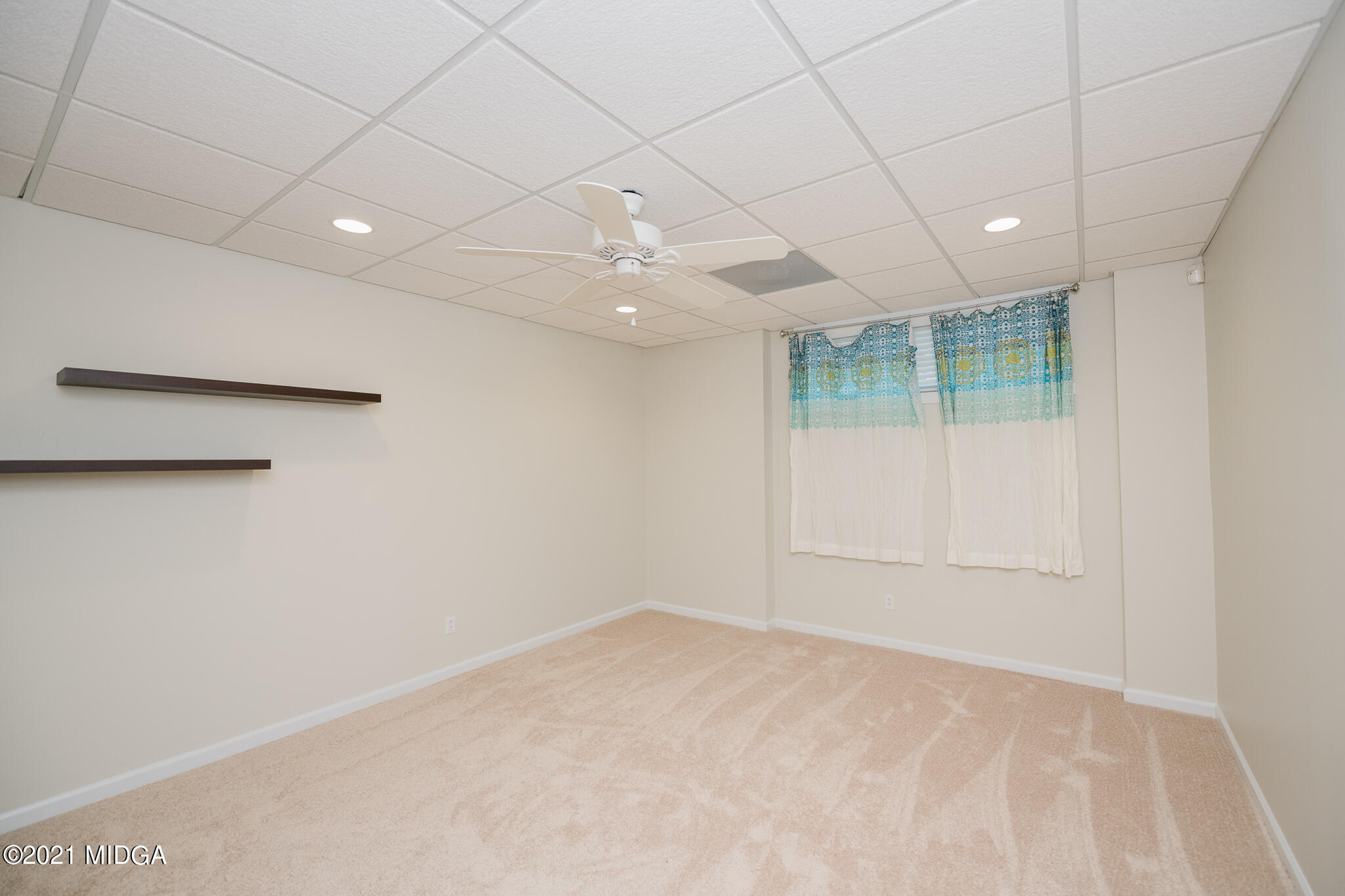 116 Hampton Ridge Road Macon, GA 31220 - Photo 59 of 77 an empty room with a empty space and windows
