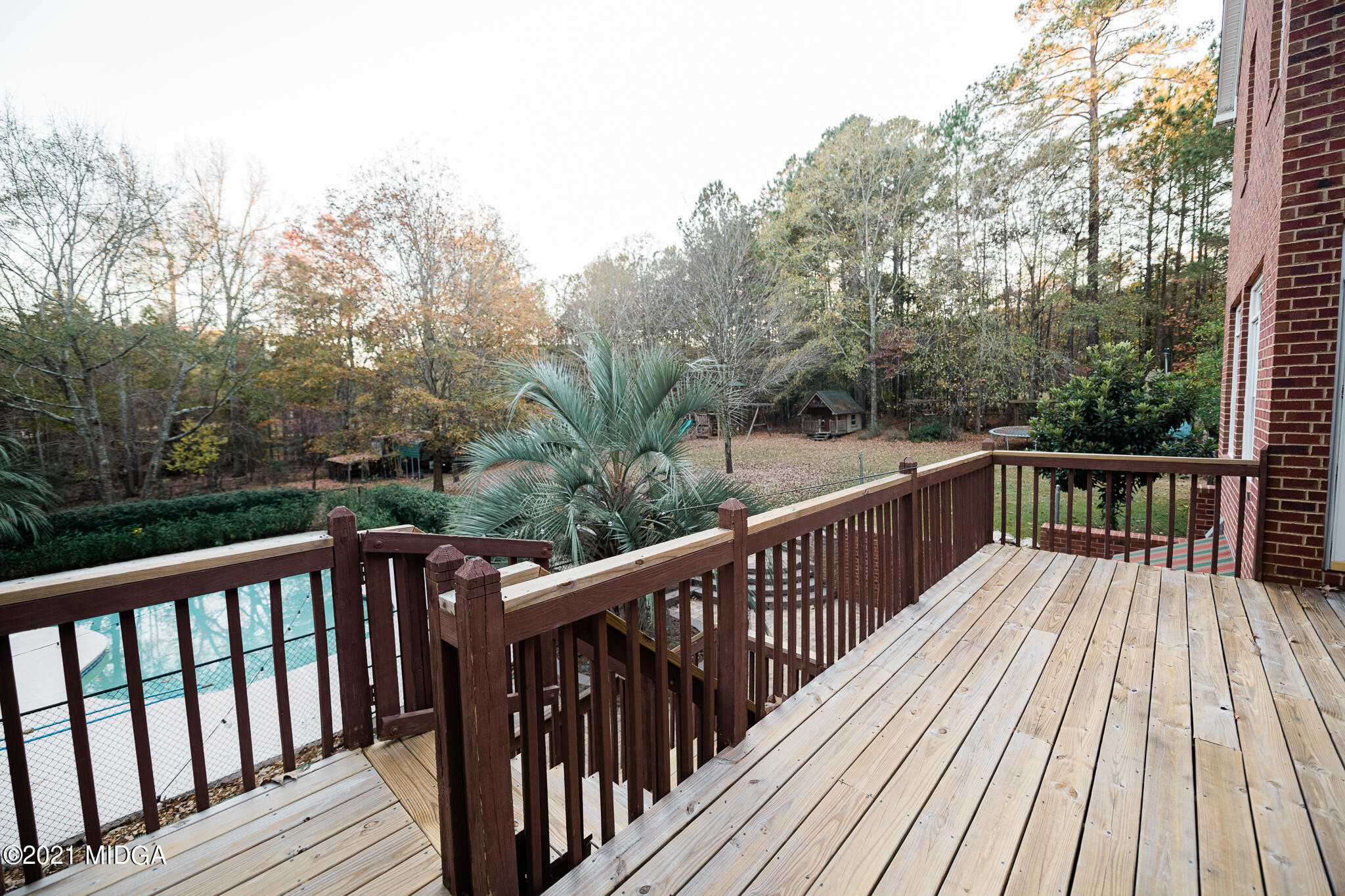 116 Hampton Ridge Road Macon, GA 31220 - Photo 70 of 77 a view of balcony with wooden floor and fence