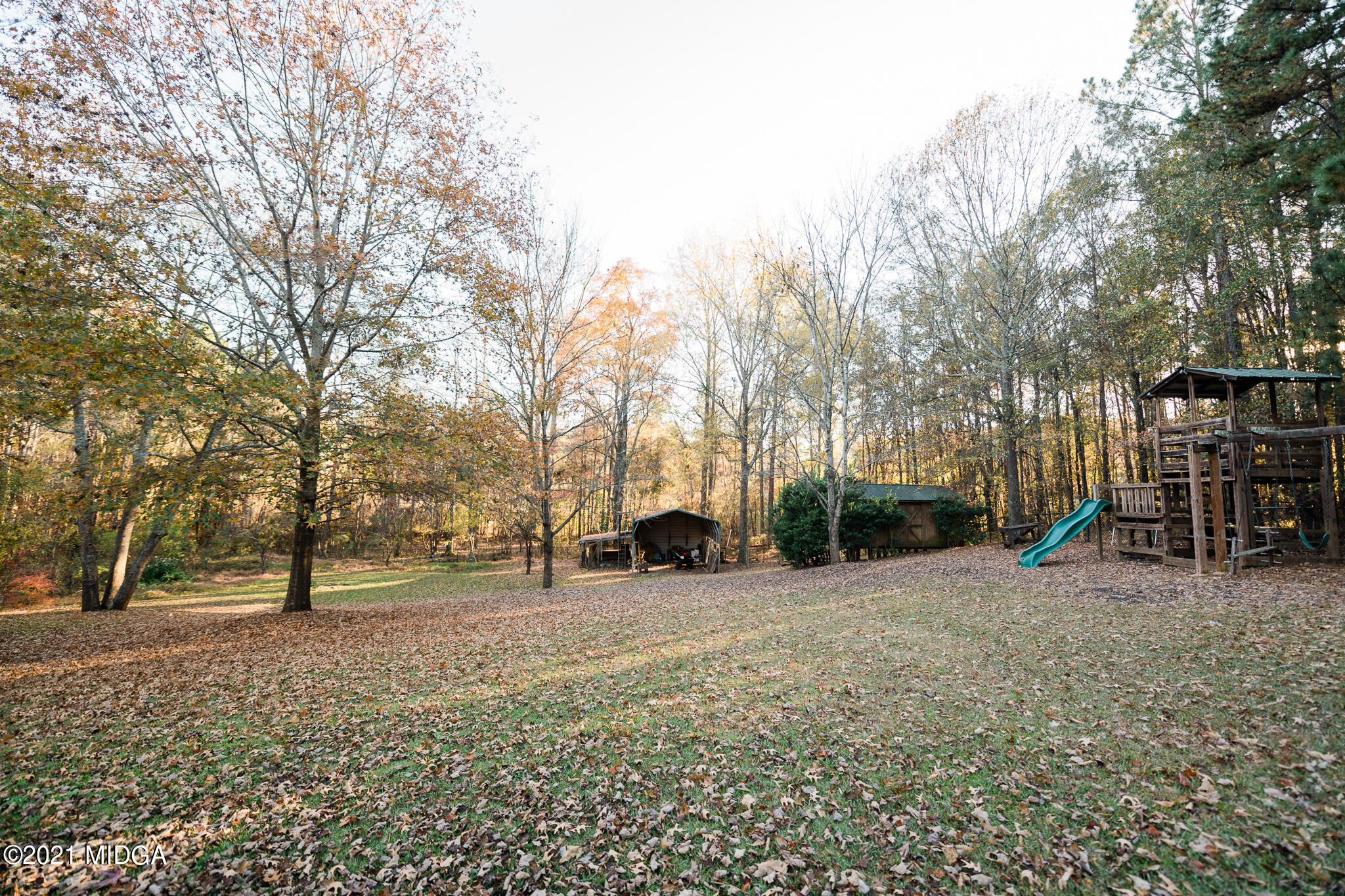 116 Hampton Ridge Road Macon, GA 31220 - Photo 71 of 77 a view of outdoor space with deck and tree