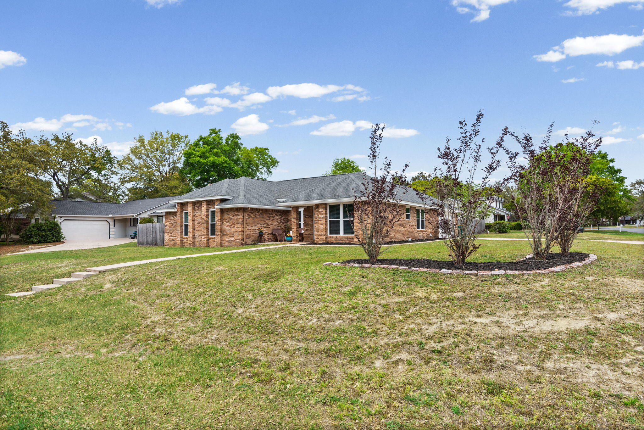 943 Ridgewood Way Niceville, FL 32578 - Photo 3 of 42 a view of a house with a yard
