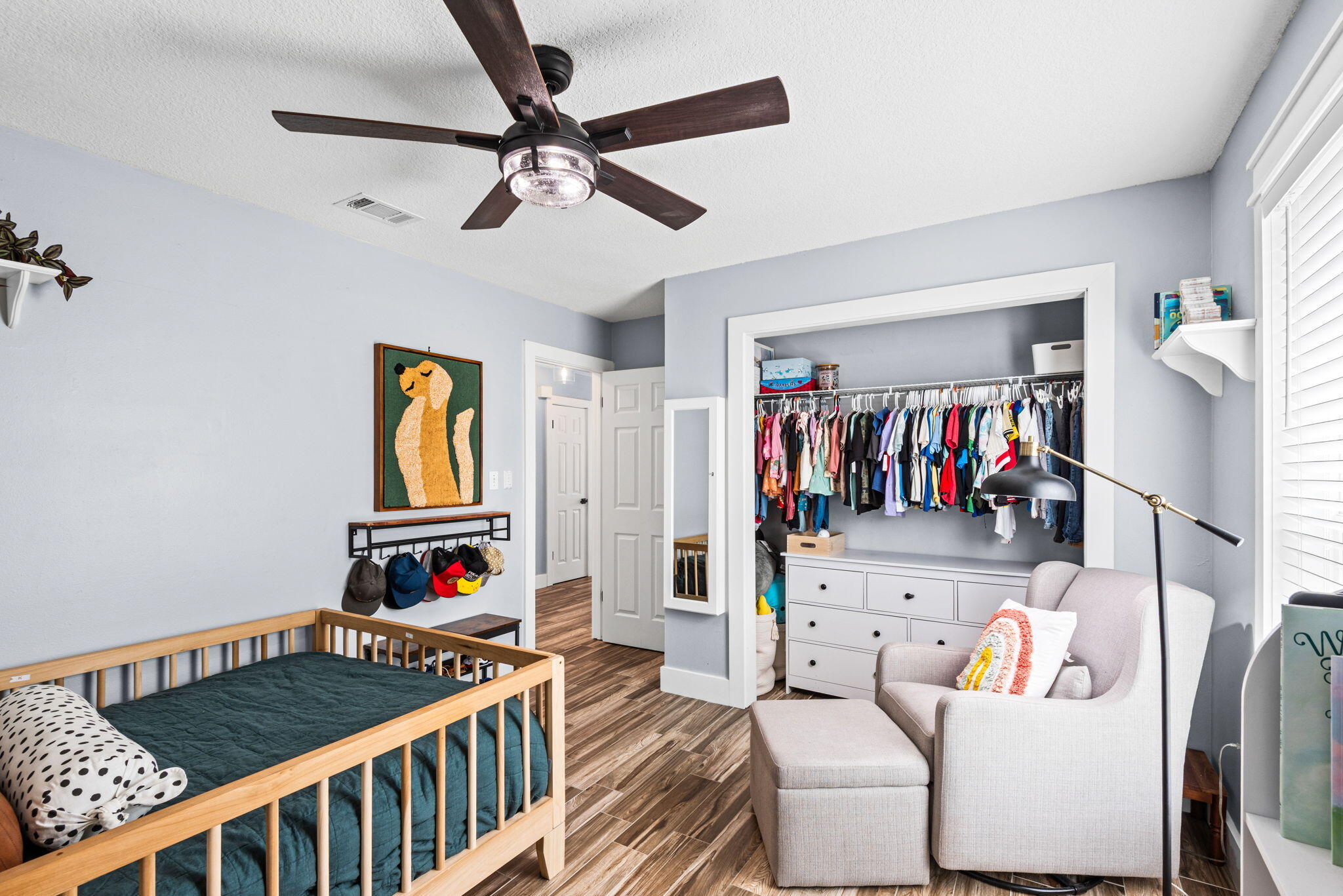 943 Ridgewood Way Niceville, FL 32578 - Photo 32 of 42 a bedroom with furniture and a baby crib