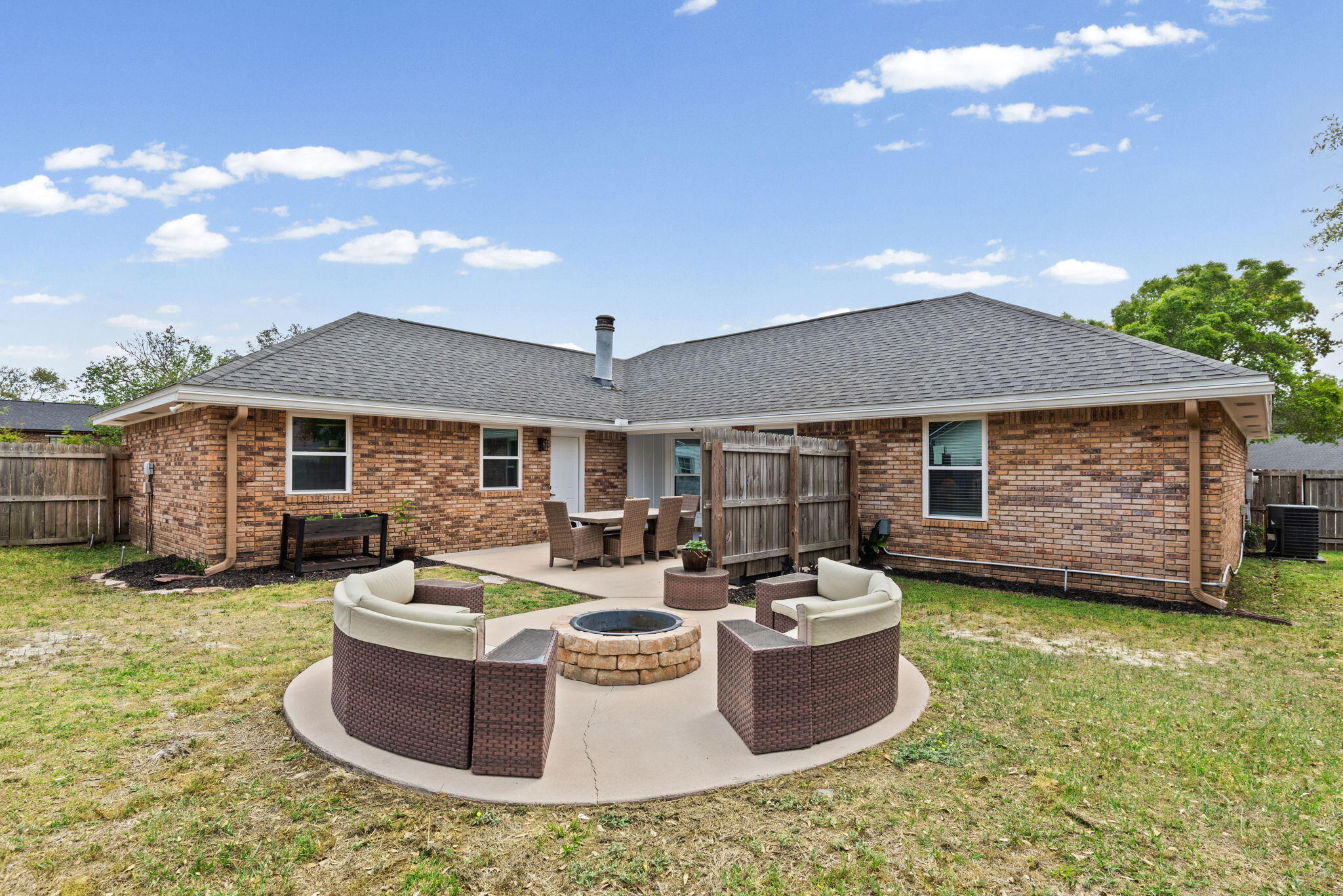943 Ridgewood Way Niceville, FL 32578 - Photo 37 of 42 a view of a house with backyard