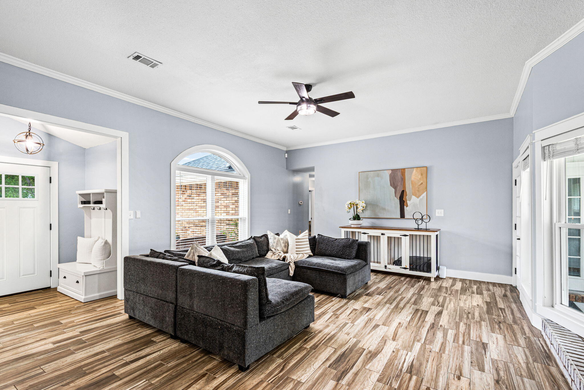 943 Ridgewood Way Niceville, FL 32578 - Photo 9 of 42 a living room with furniture and wooden floor