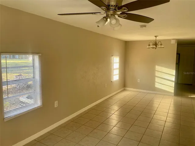 a view of an empty room and window