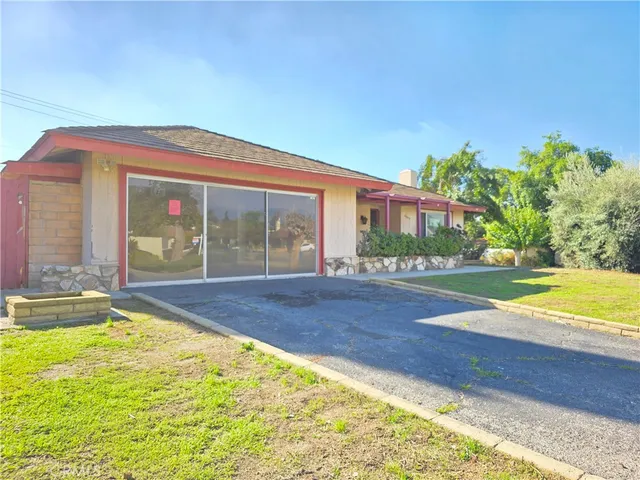 a view of a house with a swimming pool