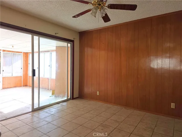 an empty room with fan