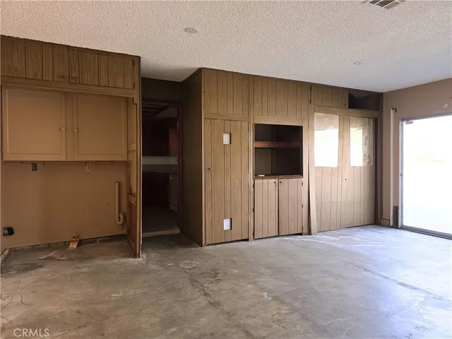 a view of a room with an empty space