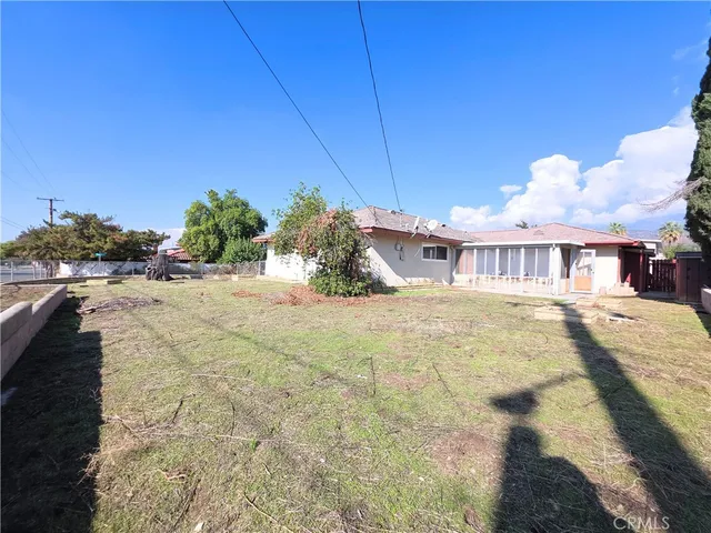 a view of a pool with an outdoor space