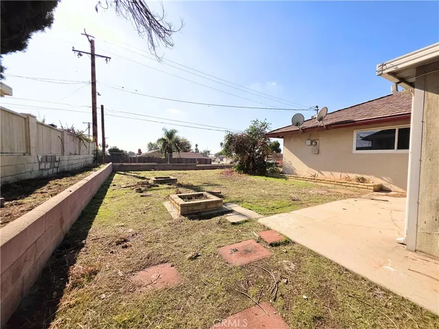 a backyard of a house with seating space
