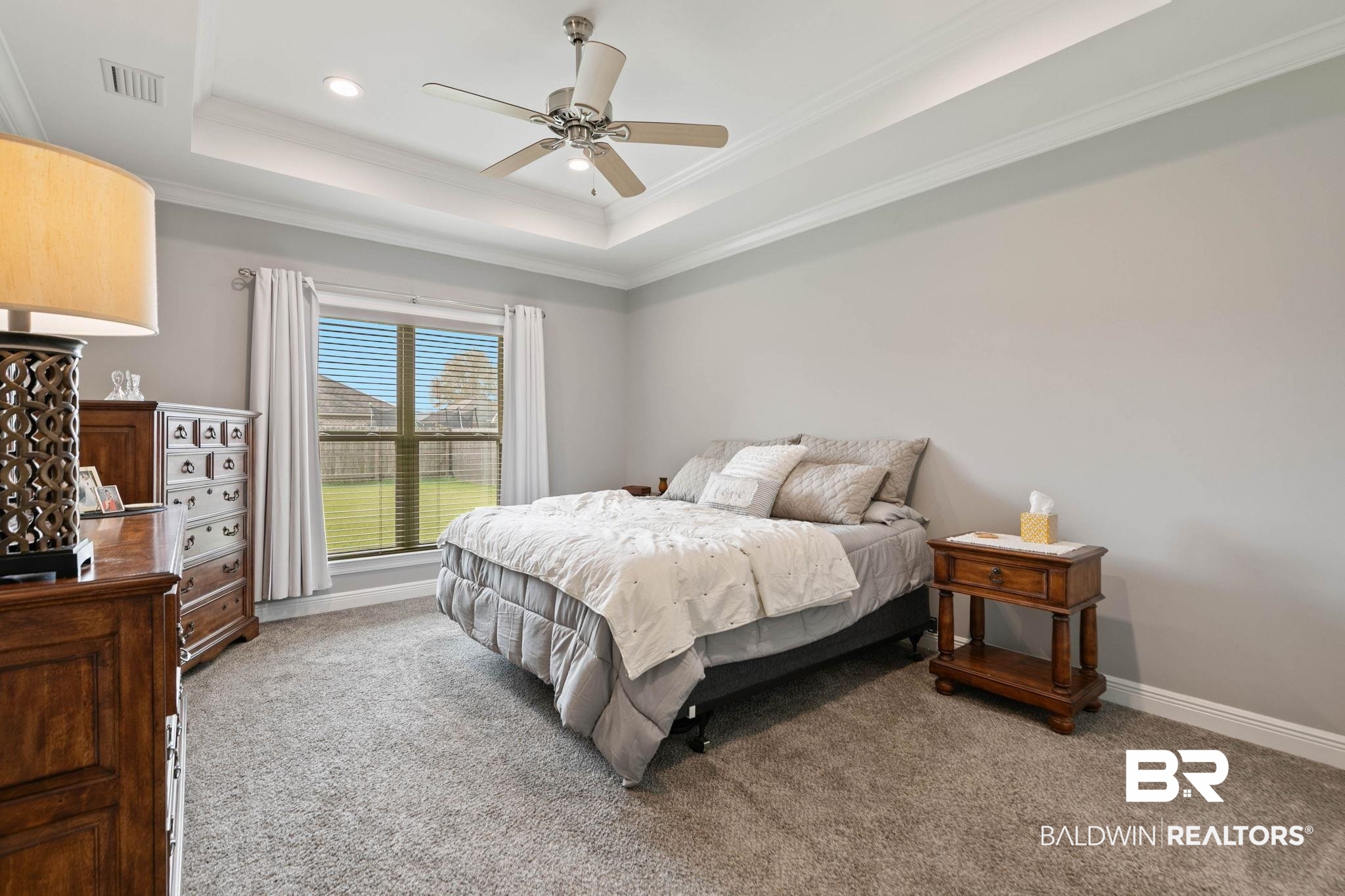9388 Pembrook Loop Fairhope, AL 36532 - Photo 30 of 53 Bedroom with crown molding, carpet, a tray ceiling, ceiling fan, and recessed lighting
