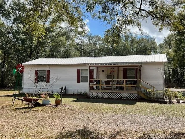 a view of a house with a patio