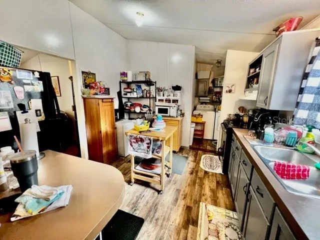 a dinning area with furniture and rug