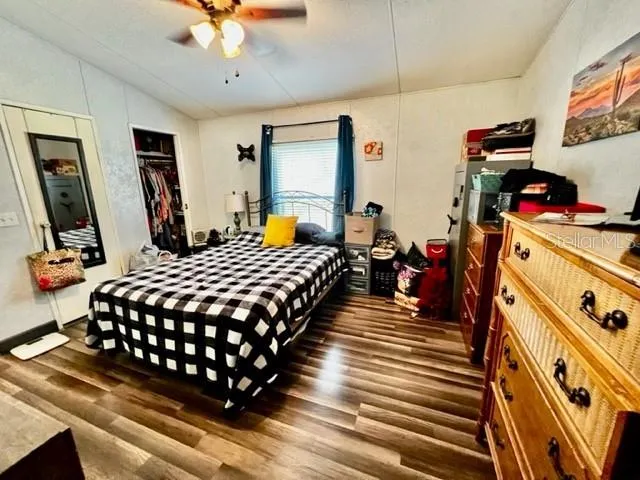 a bed room with a bed and a window