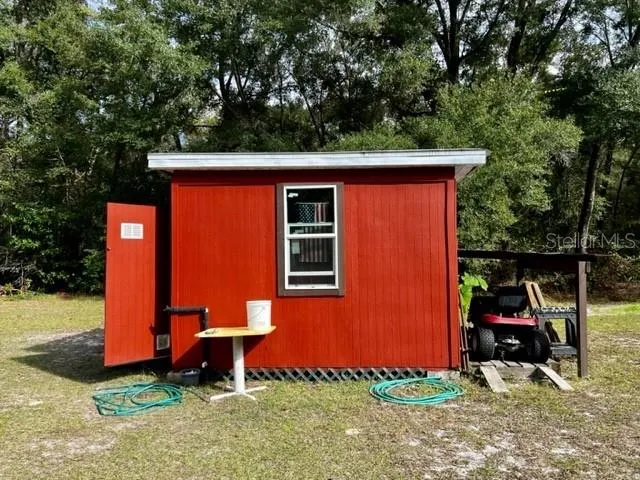 a view of a backyard with a garden