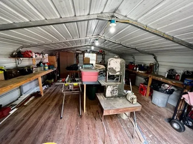 a backyard of a house with a lake view