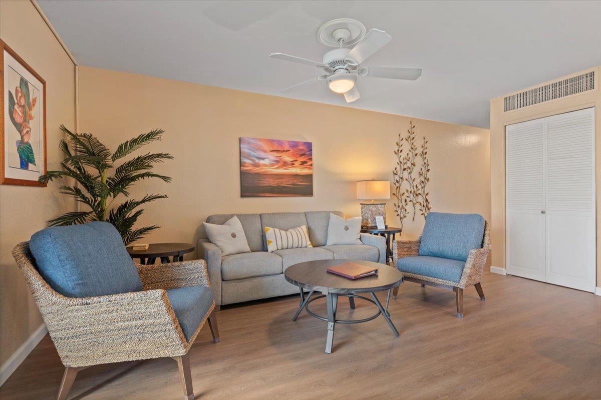 36 South Kihei Road, Unit 103 Kihei, HI 96753 - Photo 15 of 37 a living room with furniture and a chair