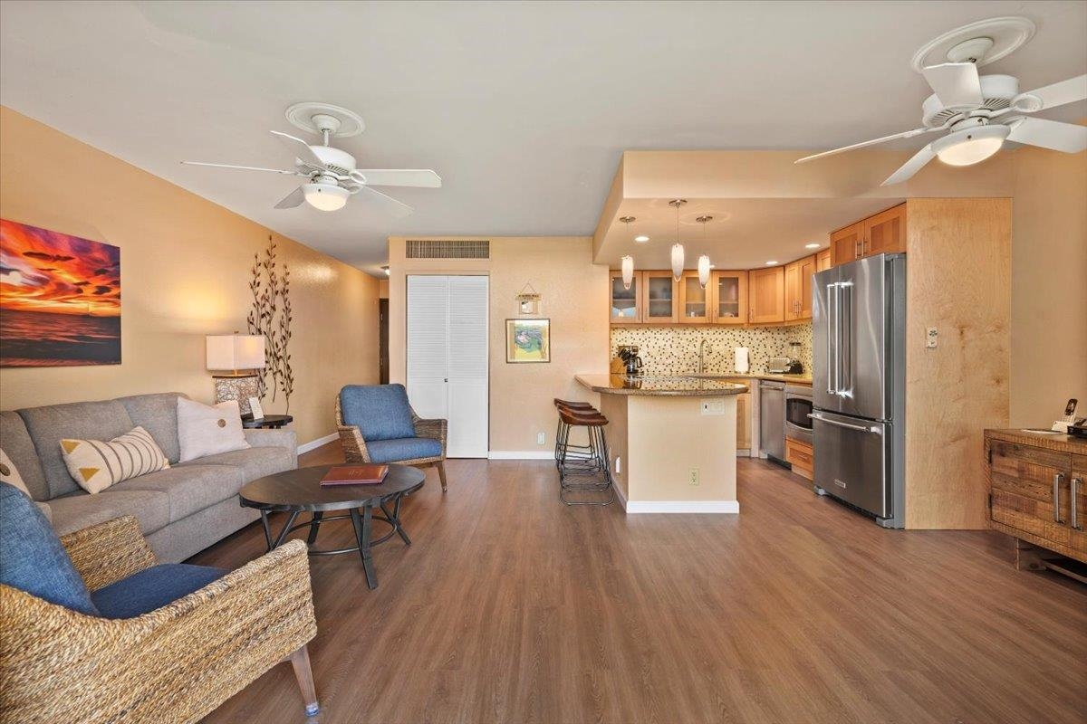 36 South Kihei Road, Unit 103 Kihei, HI 96753 - Photo 17 of 37 a living room with stainless steel appliances furniture and a kitchen view
