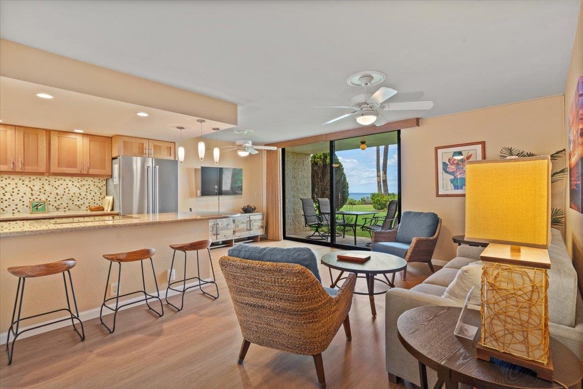 36 South Kihei Road, Unit 103 Kihei, HI 96753 - Photo 5 of 37 a view of a dining room with furniture window and outside view