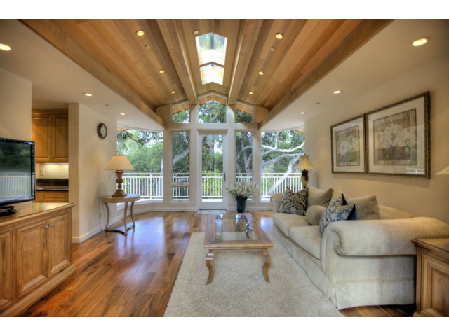 7540 Monterra Ranch Road Monterey, CA 93940 - Photo 12 of 25 a living room with furniture a flat screen tv and a large window