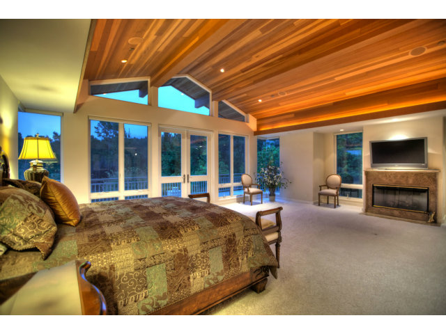 7540 Monterra Ranch Road Monterey, CA 93940 - Photo 13 of 25 a bedroom with furniture and large window