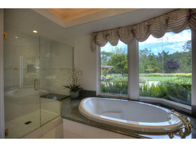 7540 Monterra Ranch Road Monterey, CA 93940 - Photo 16 of 25 a view of bathroom with bathtub and shower
