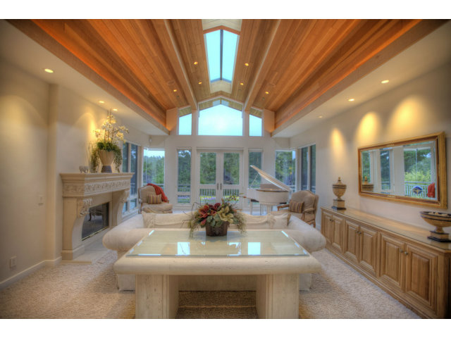 7540 Monterra Ranch Road Monterey, CA 93940 - Photo 5 of 25 a living room with fireplace furniture and a large window