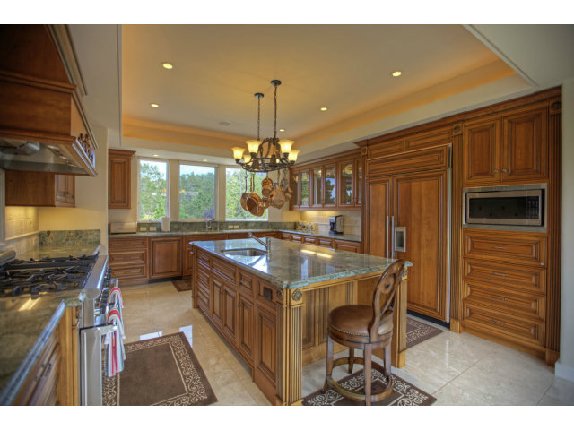 7540 Monterra Ranch Road Monterey, CA 93940 - Photo 6 of 25 a kitchen with stainless steel appliances granite countertop a stove a sink and a refrigerator