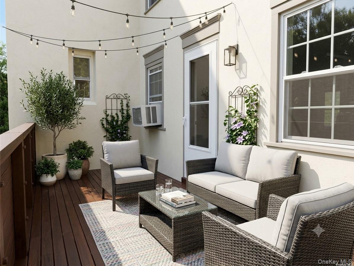 107 Kensington Road, Unit 5 Bronxville, NY 10708 - Photo 2 of 20 a view of a patio with couches and a potted plant on a table