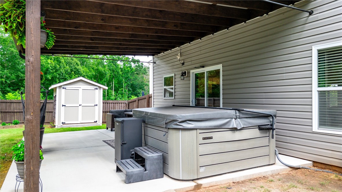 34 Karkinnen Court Pendleton, SC 29670 - Photo 27 of 36 Relax and unwind on a private patio. Outbuilding for extra storage/