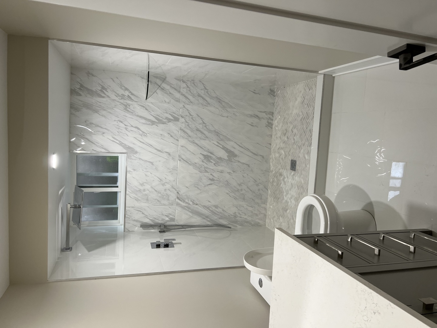 9446 Kolmar Avenue Skokie, IL 60076 - Photo 13 of 17 a bathroom with a sink and mirror