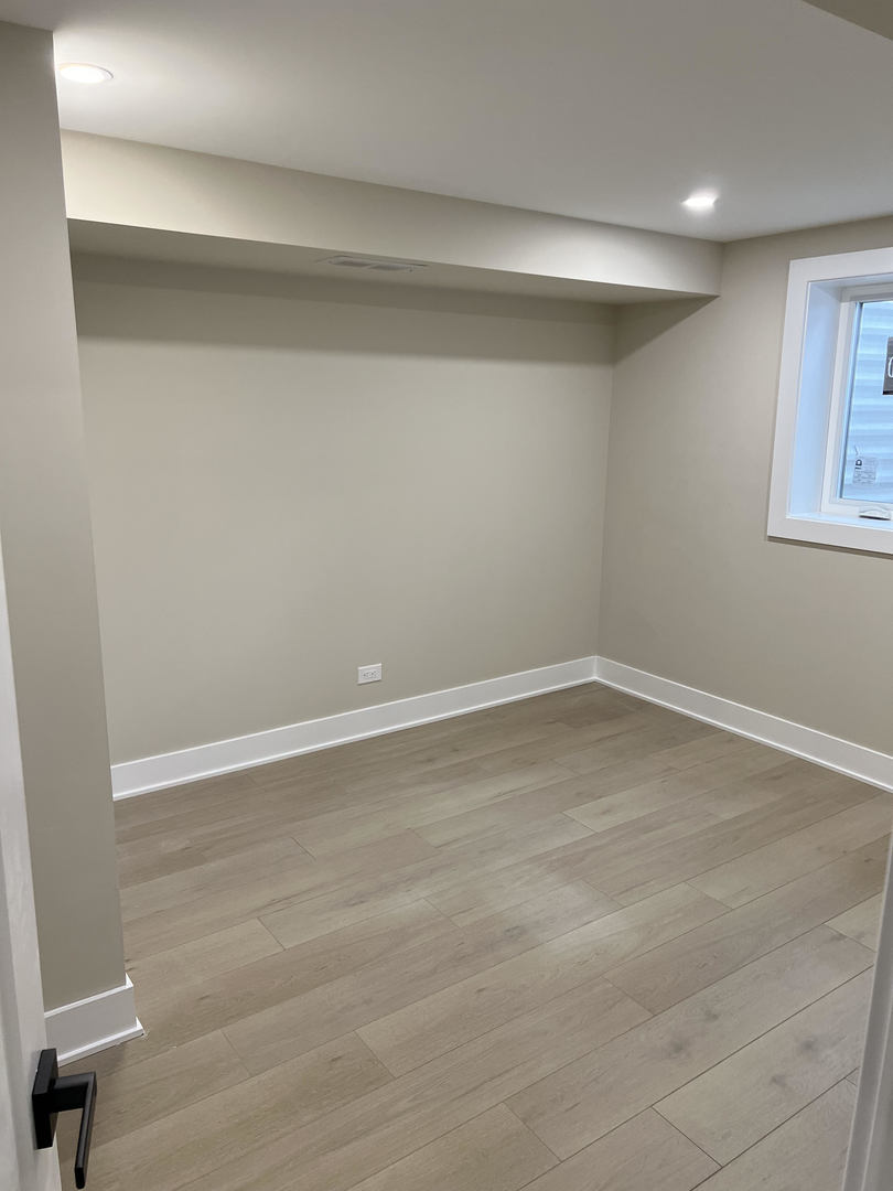 9446 Kolmar Avenue Skokie, IL 60076 - Photo 15 of 17 a view of an empty room