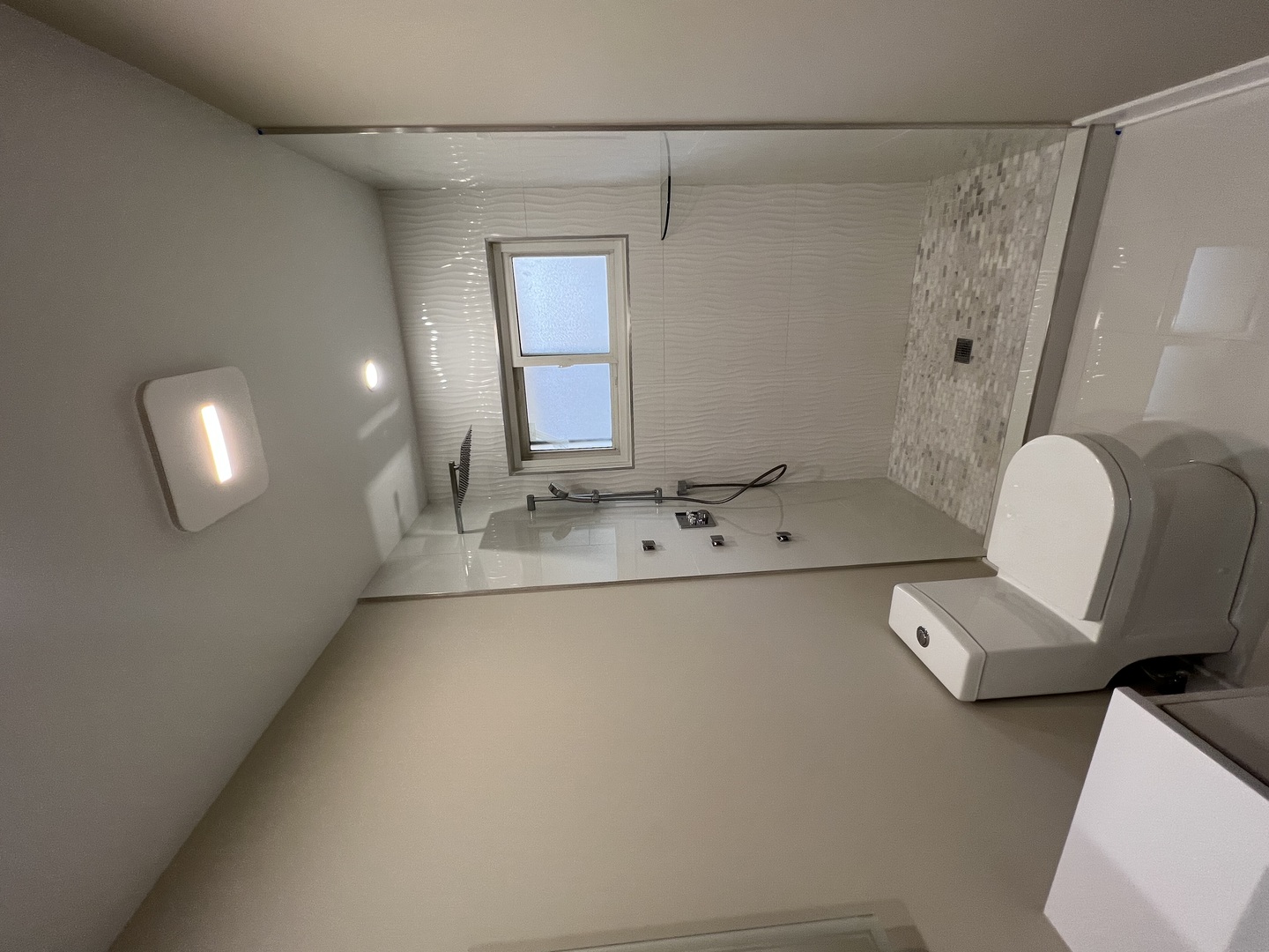 9446 Kolmar Avenue Skokie, IL 60076 - Photo 7 of 17 a bathroom with a sink a mirror and a toilet