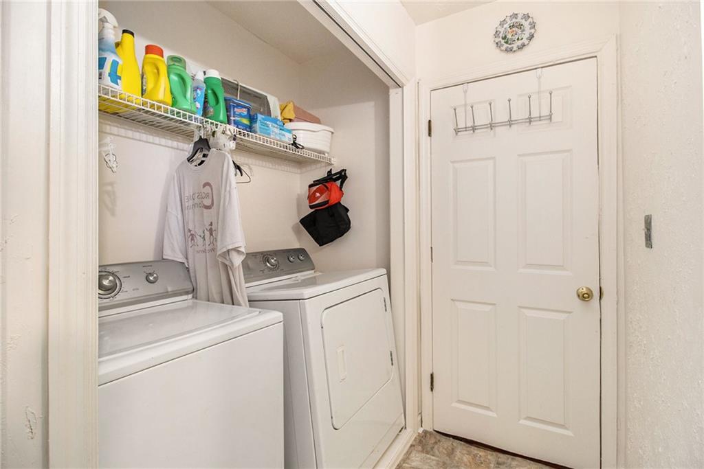 4526 Golf Vista Circle Decatur, GA 30035 - Photo 16 of 31 a utility room with dryer and washer