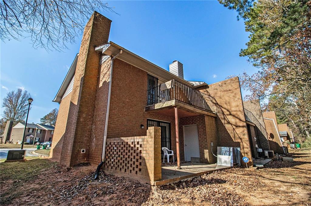 4526 Golf Vista Circle Decatur, GA 30035 - Photo 26 of 31 a view of a house with a yard