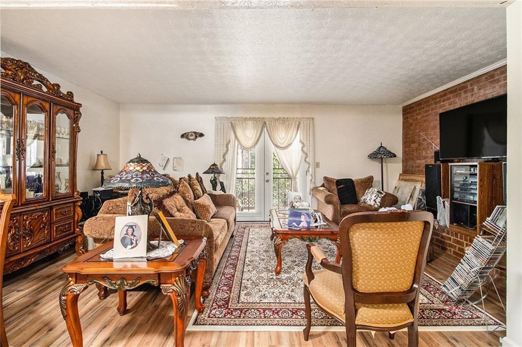 4526 Golf Vista Circle Decatur, GA 30035 - Photo 9 of 31 a view of a livingroom with furniture and a flat screen tv