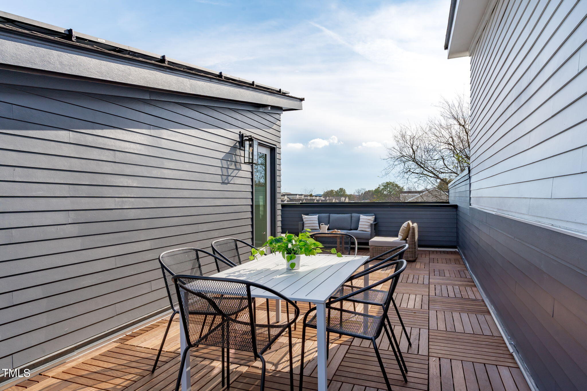 624 Rocky Knob Court Raleigh, NC 27601 - Photo 26 of 47 a view of a patio on the roof deck