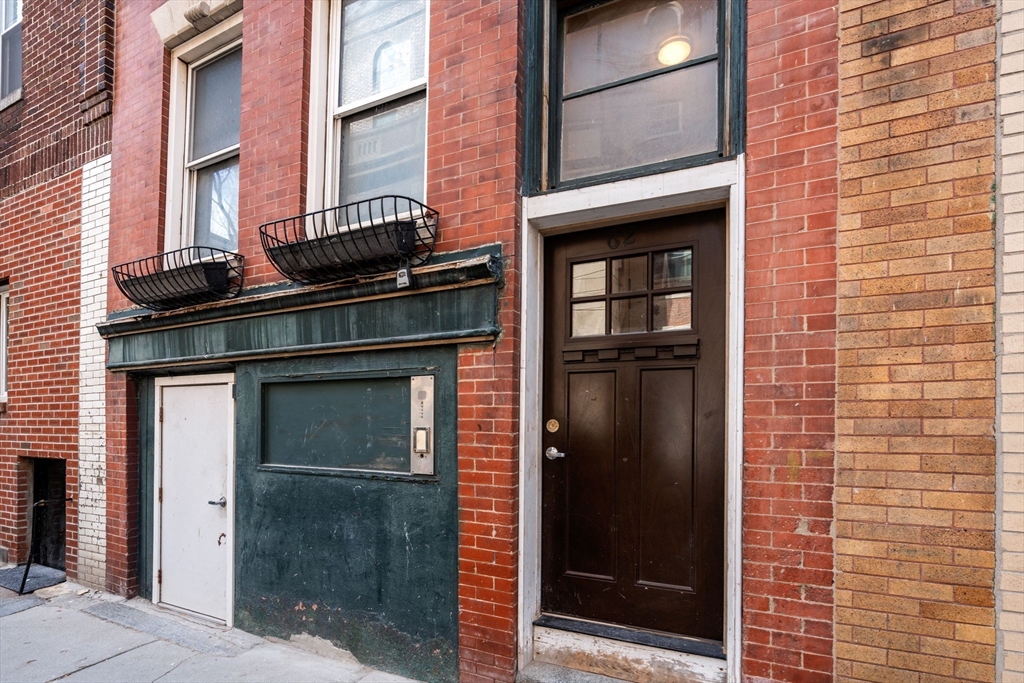 62 North Margin Street, Unit 2 Boston, MA 02113 - Photo 2 of 10 a kitchen with a refrigerator and a sink