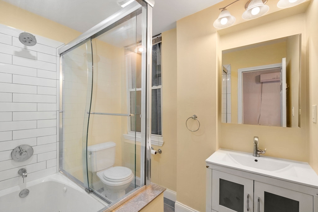 62 North Margin Street, Unit 2 Boston, MA 02113 - Photo 9 of 10 a bathroom with a sink and a mirror