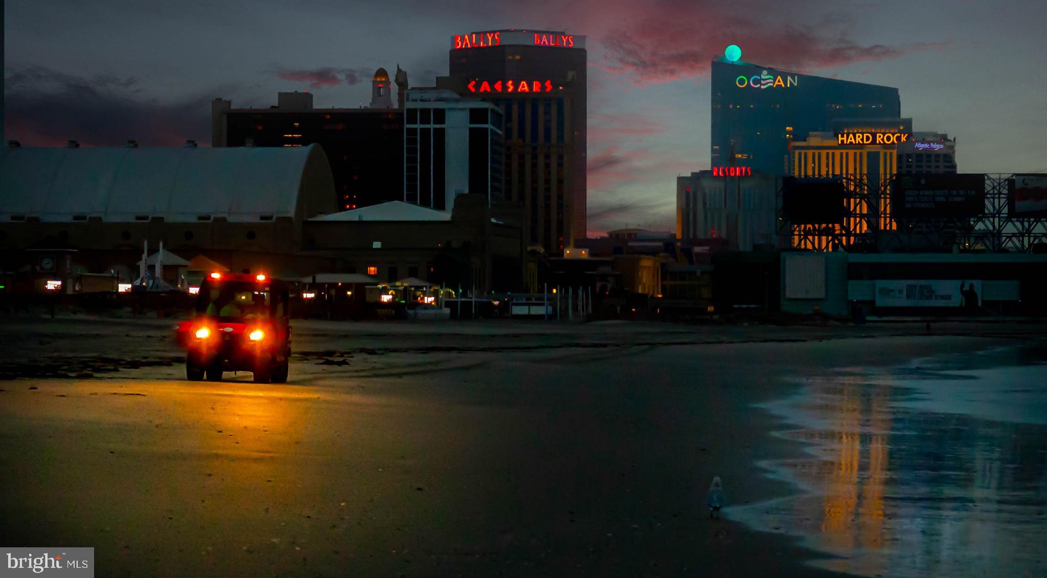 101 South Raleigh Avenue Atlantic City, NJ 08401 - Photo 26 of 26 City lights reflect on tranquil shore.