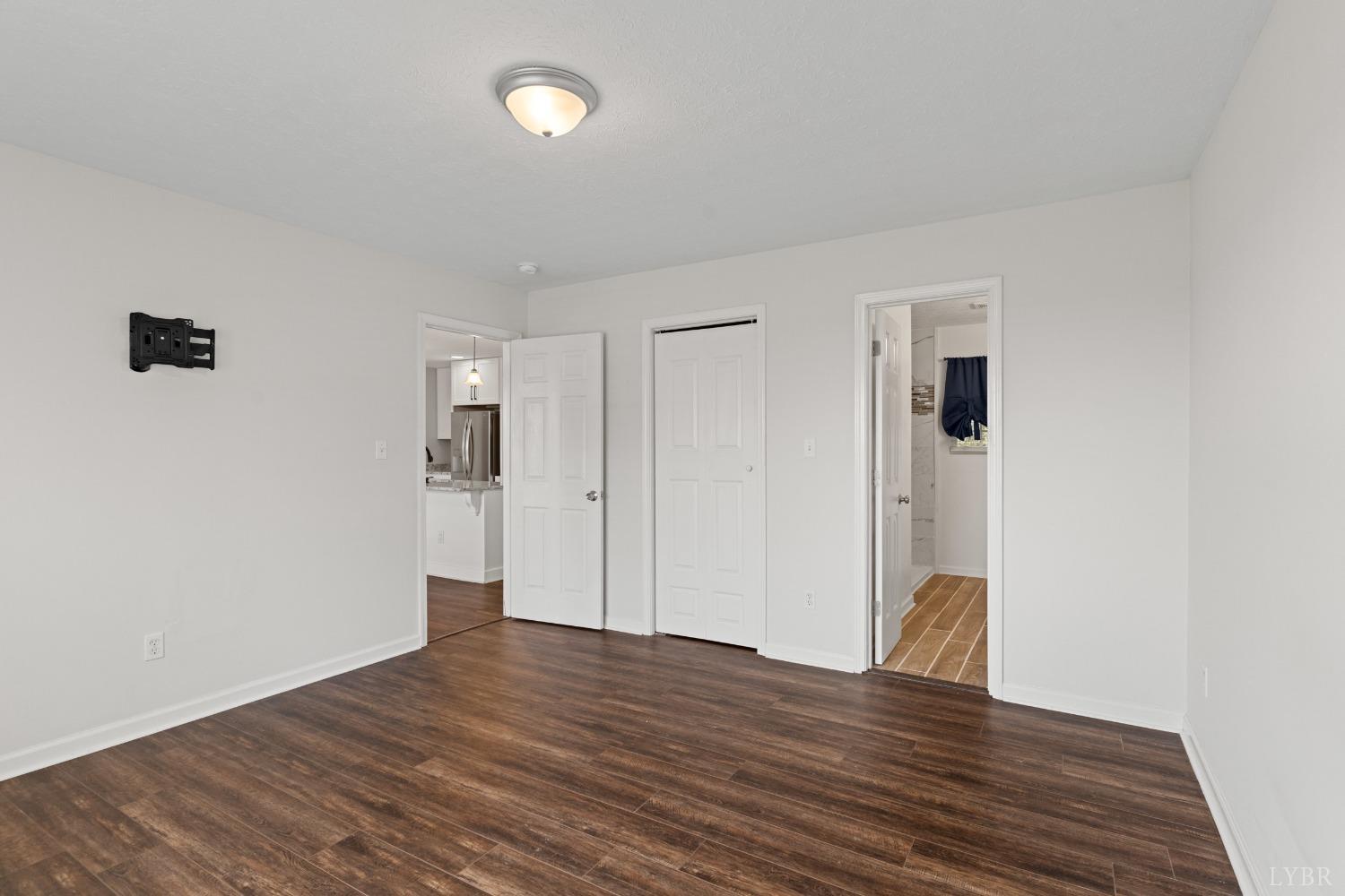 4657 Stage Road Concord, VA 24538 - Photo 20 of 29 a view of wooden floor and windows in a room