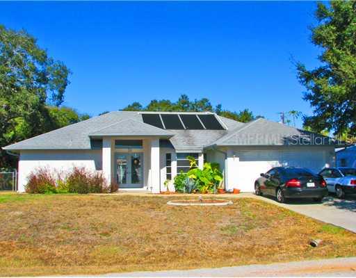 150 Avalon Road Venice, FL 34293 - Photo 1 of 1 a front view of a house with a garden