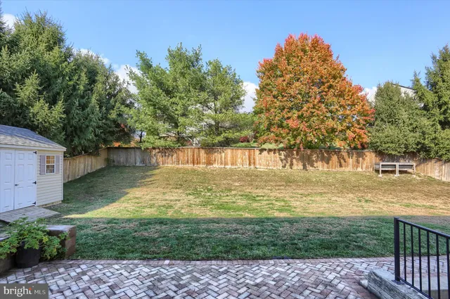 a view of a yard with an outdoor space