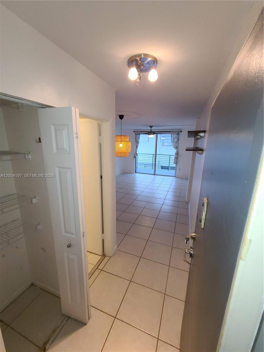 1605 Bay Road, Unit 206 Miami Beach, FL 33139 - Photo 13 of 43 Guest bathroom on the left, entering the unit