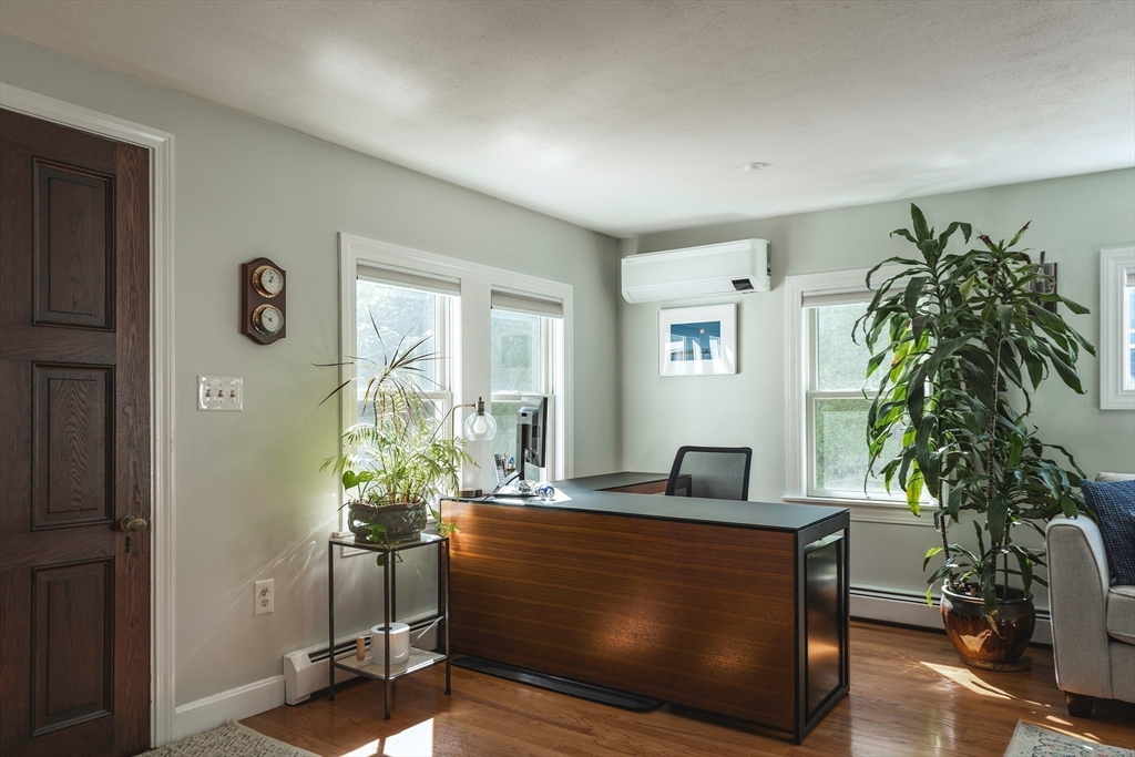 50 Jeffrey's Neck Road Ipswich, MA 01938 - Photo 26 of 41 a view of living room filled with furniture and a potted plant